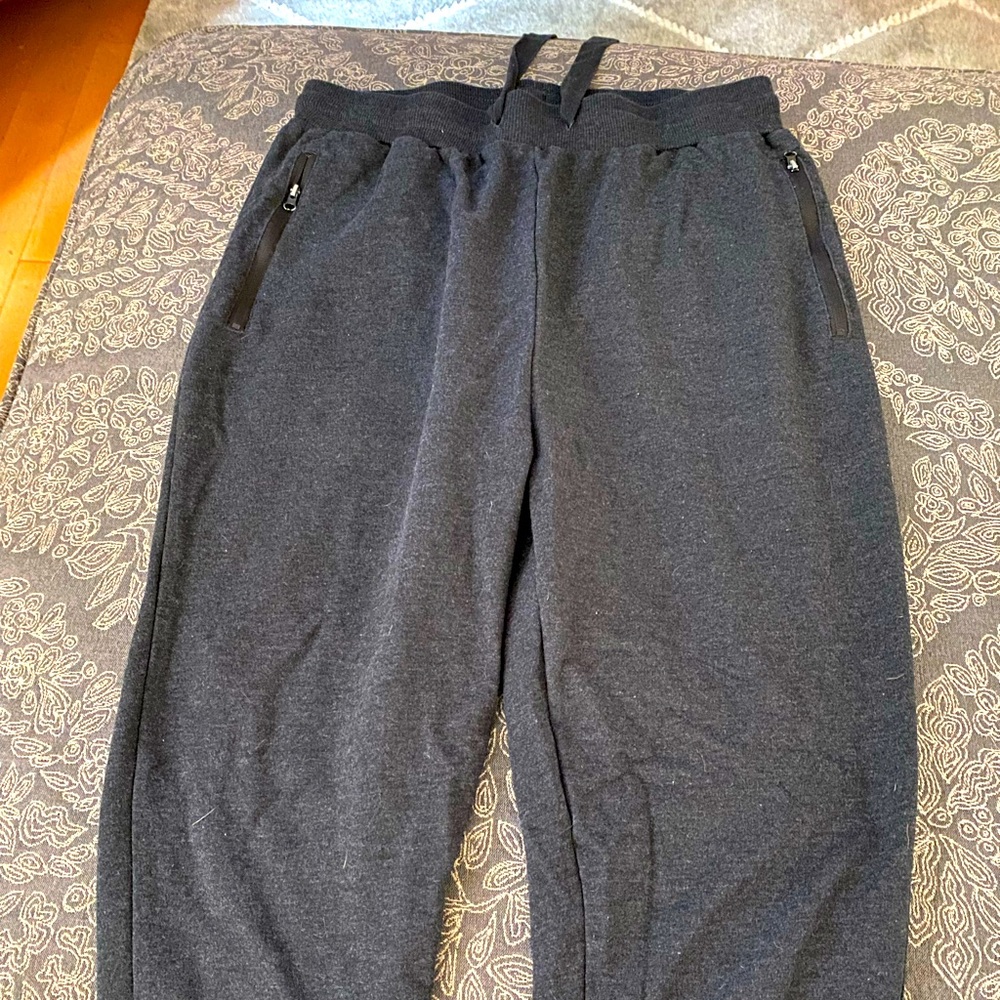 2 pair grey sweatpants joggers, zipper pockets , size medium